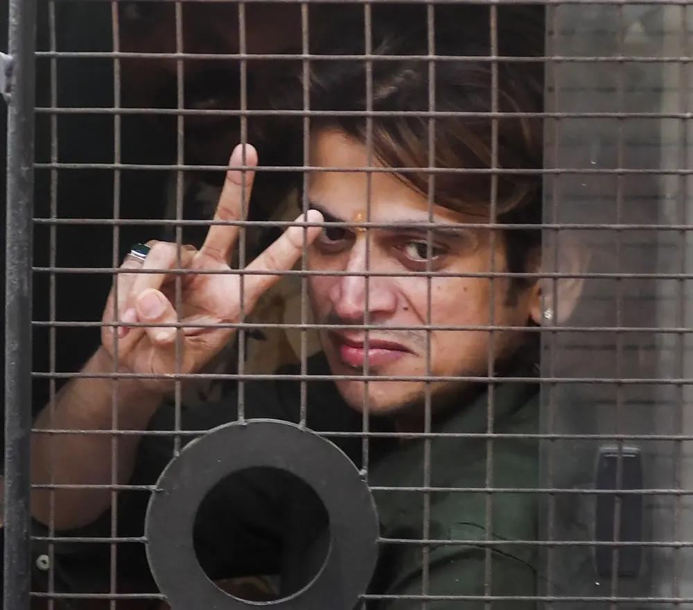 Shiv Sena (Shinde) worker Rahul Kanal being escorted after he was arrested for allegedly vandalising the Habitat Studio | PTI