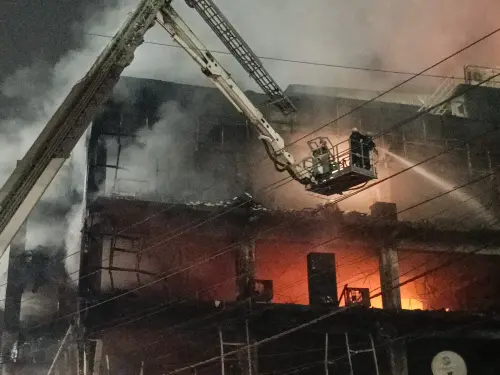 Firefighters try to douse a fire which broke out in a building at Mundka, in West Delhi, Friday, May 13, 2022 | Photo: PTI