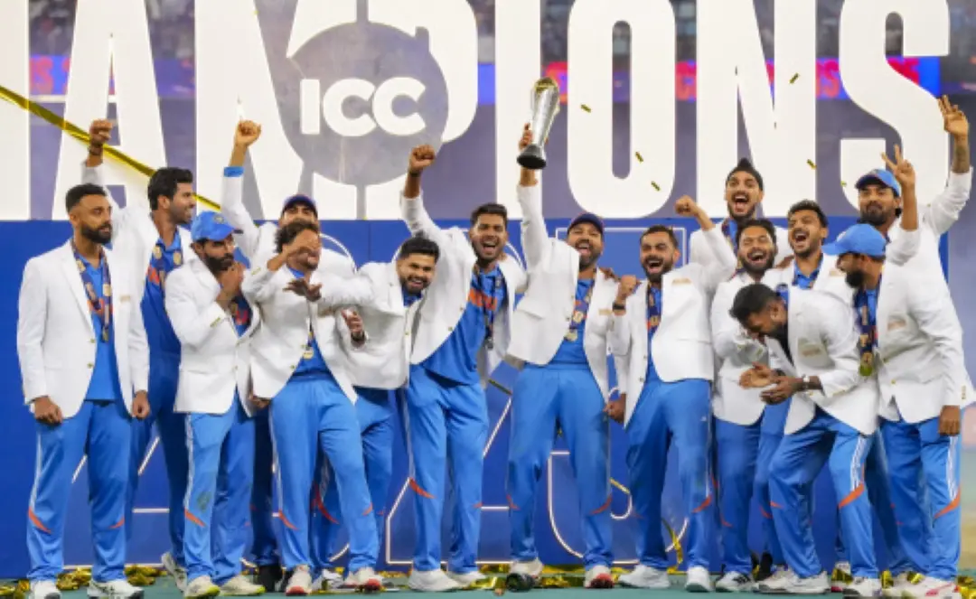Indian cricket team celebrate holding the trophy after their win against New Zealand in the ICC Champions Trophy 2025 final cricket match, in Dubai, UAE. | Photo: PTI