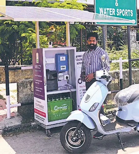 Sujith Rajan near the portable charging station / Photo: Mathrubhumi