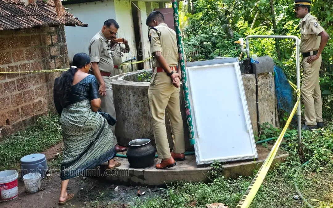 Police investigating the well where the baby's body was found