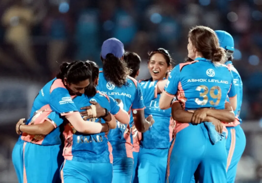 Mumbai Indians players celebrate their win against Delhi Capitals in the Women's Premier League (WPL) 2025 final cricket match. | Photo: PTI