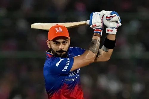 Royal Challengers Bengaluru's Virat Kohli plays a shot during the Indian Premier League (IPL) Twenty20 cricket match between Rajasthan Royals and Royal Challengers Bengaluru at the Sawai Mansingh Stadium in Jaipur on Saturday. l Photo: AFP