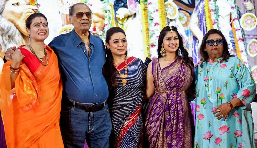 File photo of actors Kajol Devgan, Rani Mukerji, Tanishaa Mukerji and Sharbani Mukherjee with Deb Mukherjee at a community puja 'pandal' during 'Durga Puja' festival in Mumbai.