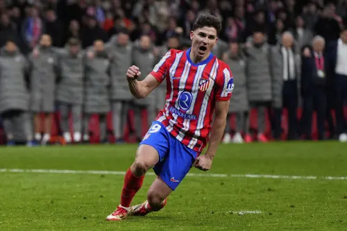 Atletico Madrid's Julian Alvarez, reacts after falling to the ground taking a penalty kick during a shootout at the end of the Champions League round of 16, second leg, soccer match between Atletico Madrid and Real Madrid at the Metropolitano stadium in Madrid, Spain, Wednesday, March 12, 2025. The goal was later disallowed. | Photo: AP