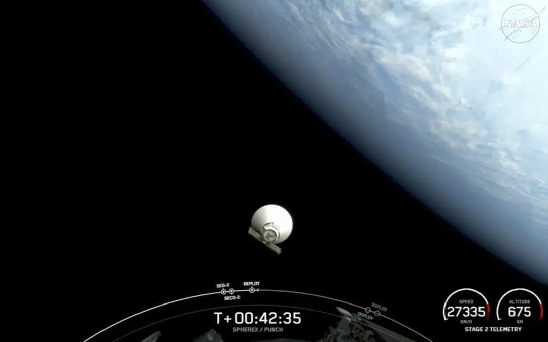 In this image taken from video released by SpaceX, NASA's newest space telescope, Spherex, drifts off into space after separating from a SpaceX rocket's upper stage after launching from Vandenberg Space Force Base
