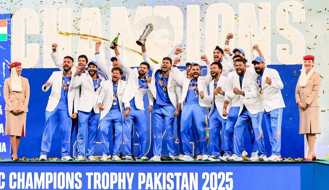 Indian players celebrate with the trophy after winning the ICC Champions Trophy 2025 final match against New Zealand, at Dubai. | Photo: ANI