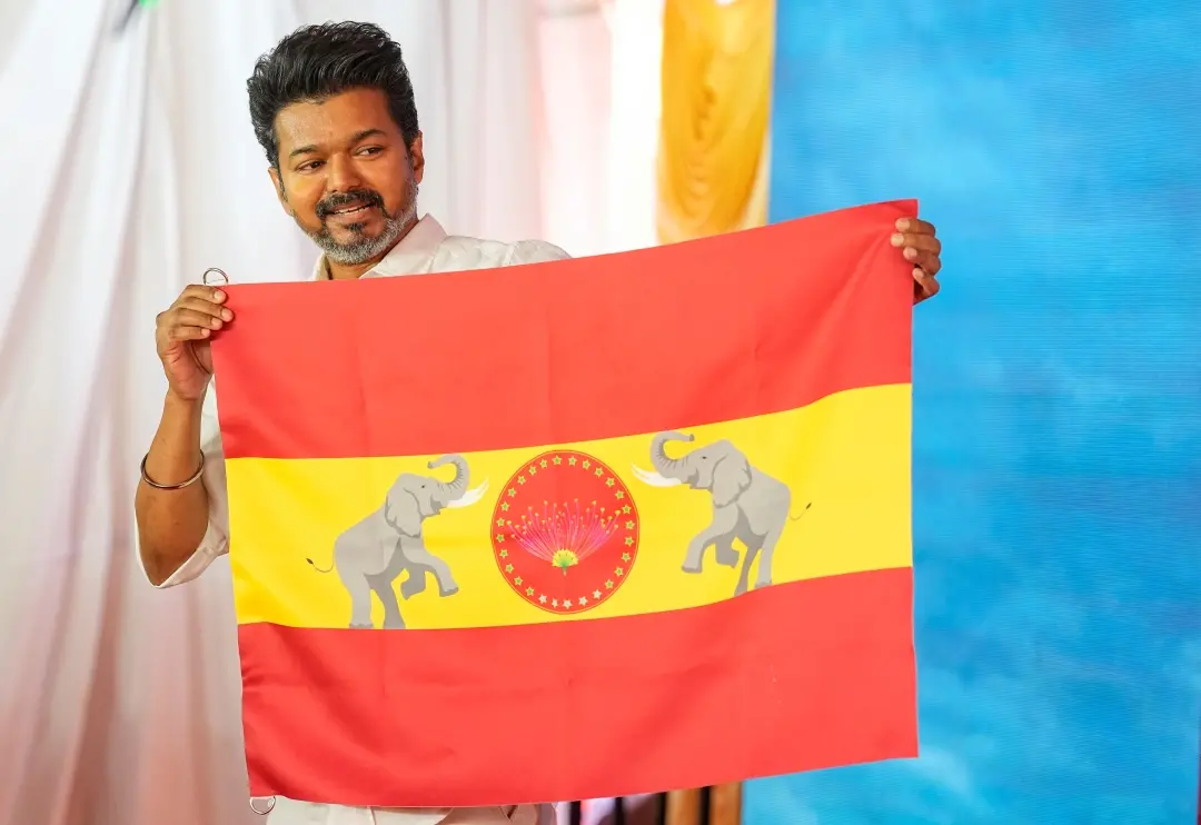 Actor-turned-politician and Tamilaga Vettri Kazhagam President Vijay unveils party's flag at party headquarters | Photo: PTI