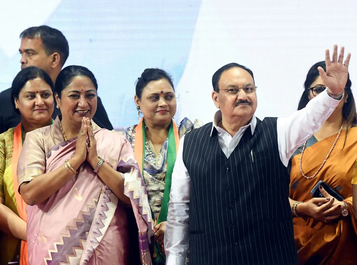 Delhi Chief Minister Rekha Gupta and Union Minister and BJP National President JP Nadda greet the gathering during Mahila Divas program organised on the occasion of International Women's Day at JLN stadium | Photo: ANI