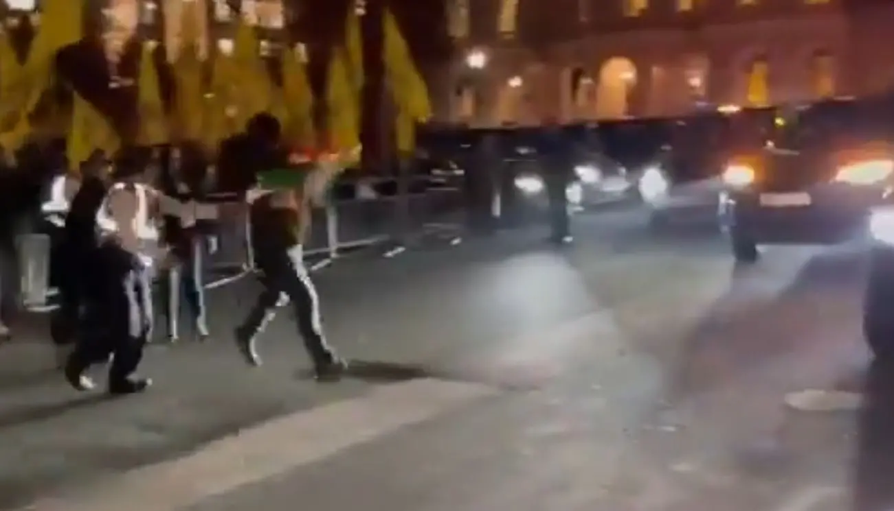 The screengrab of a video showing a man charging towards the convoy of S Jaishankar