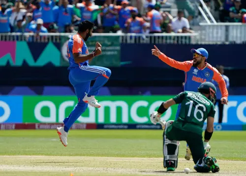 India's Jasprit Bumrah (L) celebrates after dismissing Pakistan's Mohammad Rizwan during the ICC men's Twenty20 World Cup 2024 group A cricket match between India and Pakistan at Nassau County International Cricket Stadium in East Meadow, New York. l Photo: AP