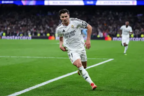 Real Madrid's Moroccan forward Brahim Diaz celebrates scoring his team's second goal during the UEFA Champions League Round of 16 first leg football match between Real Madrid CF and Club Atletico de Madrid at the Santiago Bernabeu stadium in Madrid, on March 4, 2025. | Photo: AFP