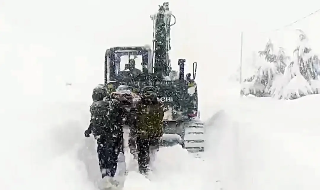 Indian Army conducts a rescue operation after 57 workers engaged in road construction got trapped under huge blocks of snow during an avalanche | ANI