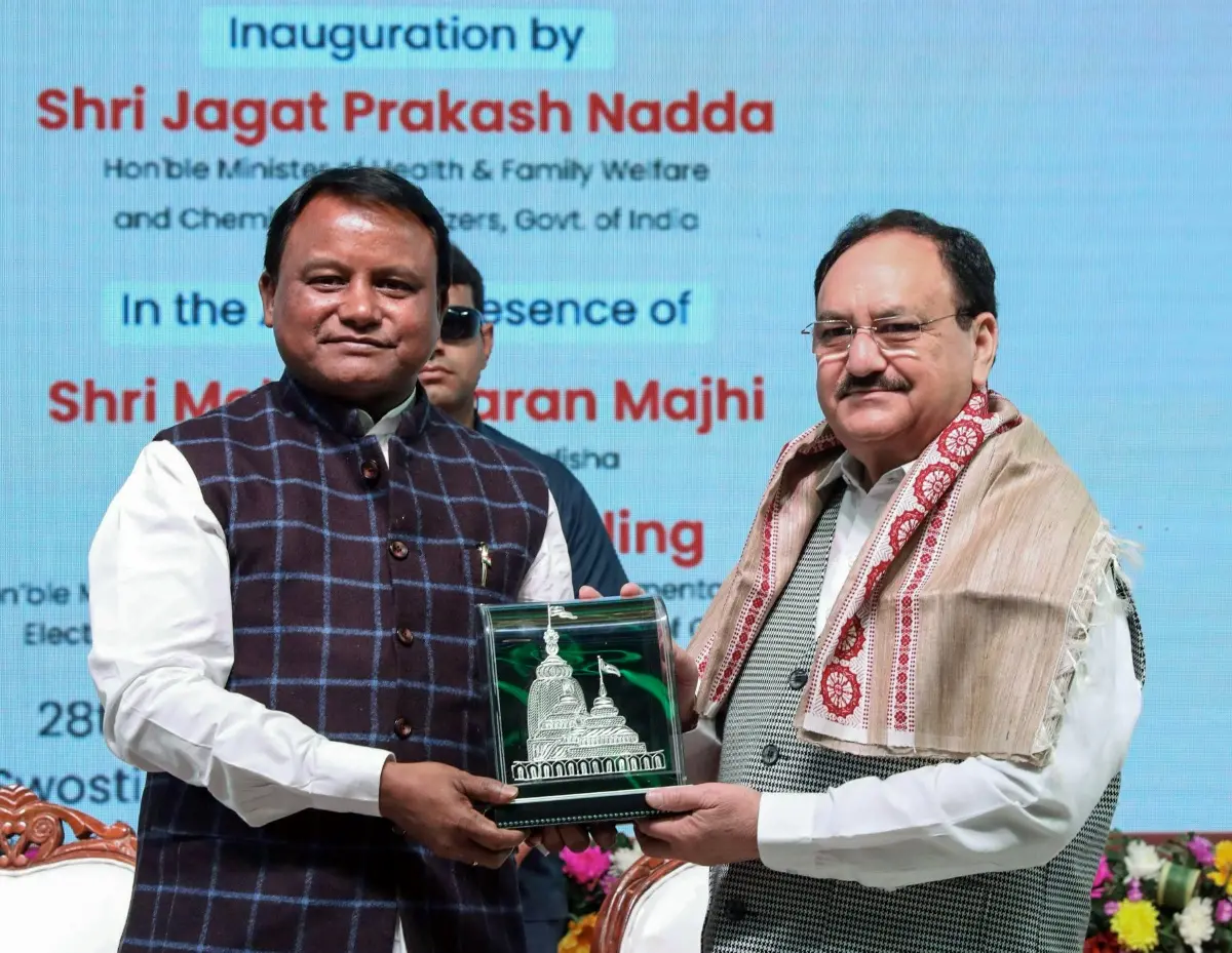 BJP National President and Union Minister JP Nadda receives a memento from Odisha Chief Minister Mohan Charan Majhi during the inauguration of the 9th National Health Mission Conference | Photo: ANI