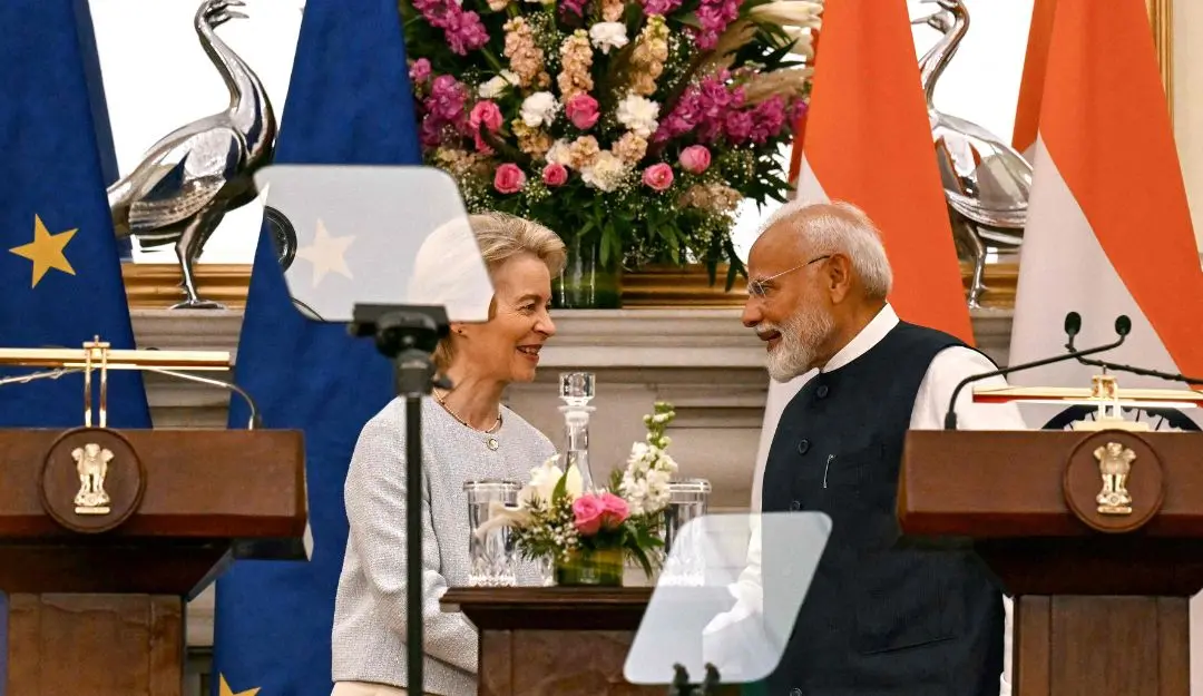 European Commission President Ursula von der Leyen (L) and India's Prime Minister Narendra Modi greet each other during a joint press briefing at the Hyderabad House in New Delhi on February 28, 2025.