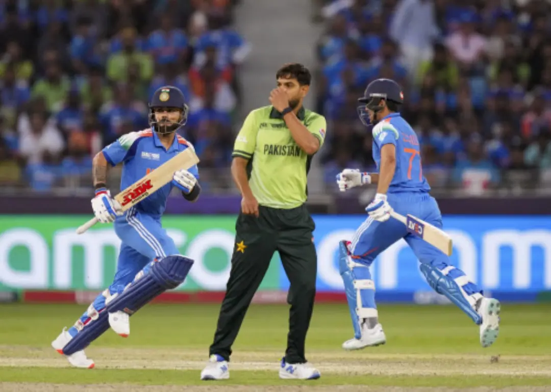 India's Virat Kohli and Shubman Gill run between the wickets during a One Day International (ODI) cricket match of the ICC Champions Trophy between India and Pakistan, at Dubai International Cricket Stadium. | Photo: PTI
