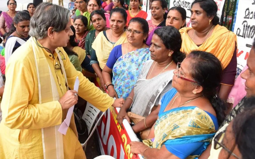 Shashi Tharoor with protesting ASHA workers in Thiruvananthapuram