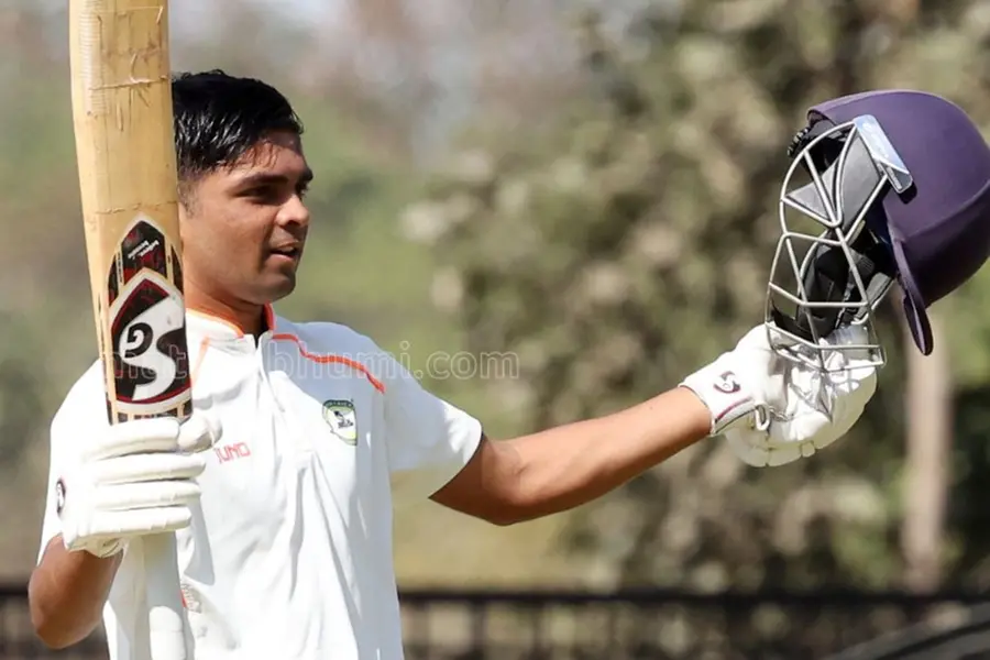 Vidarbha rides on Malewar's unbeaten ton and Karun Nair's solid 86 on first day, scores 254/4