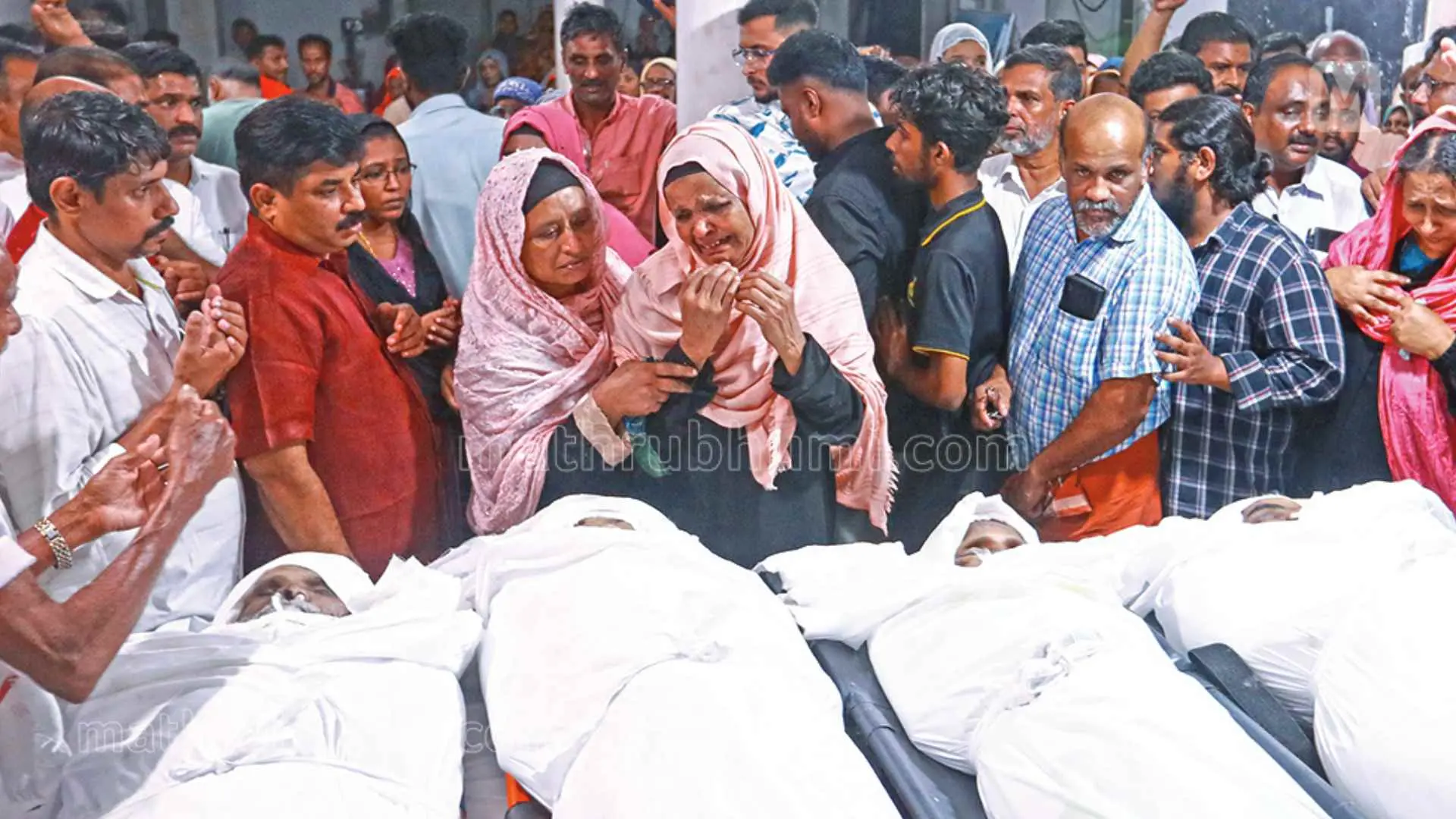 Relatives paying their last respects