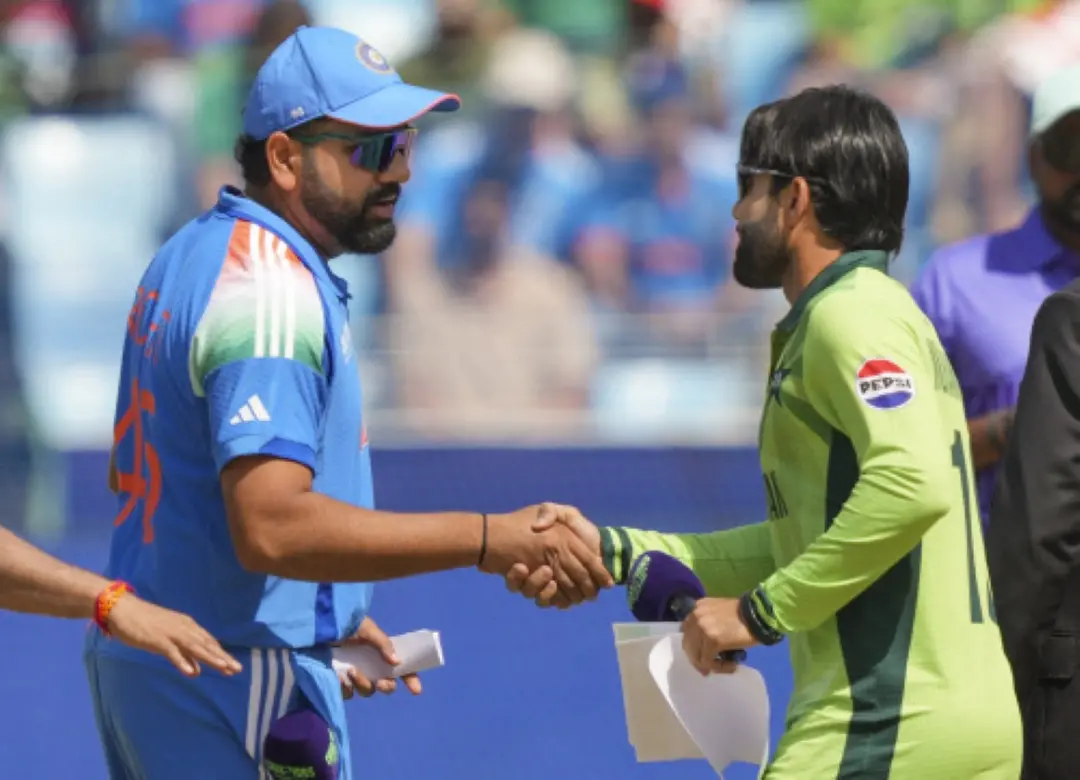 ndian captain Rohit Sharma shakes hands with Pakistan's skipper Mohammad Rizwan at the toss before the Champions Trophy 2025 match match between India and Pakistan, in Dubai. | Photo: PTI