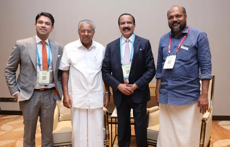 Dr Azad Moopen, Founder Chairman, Aster DM Healthcare, Anoop Moopen, Director, Aster DM Healthcare meeting Pinarayi Vijayan, Chief Minister of Kerala and P. Rajeeve, Minister for Industries, Law and Coir, during global summit 2025