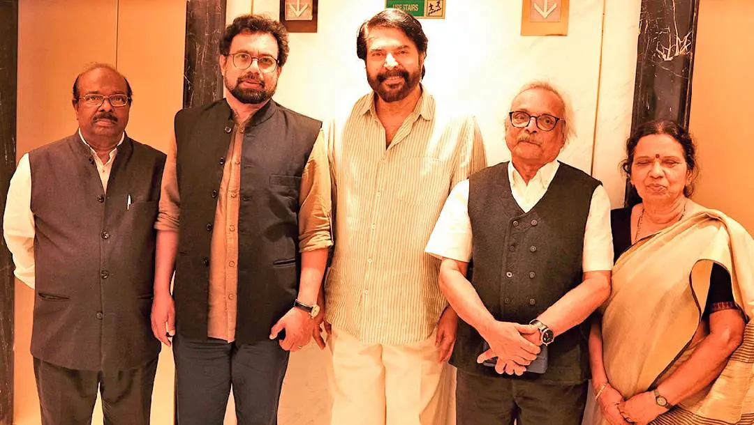 From left: Mathrubhumi's Delhi special representative, N. Asokan, MP John Brittas, actor Mammootty with writer M. Mukundan and his wife Sreeja