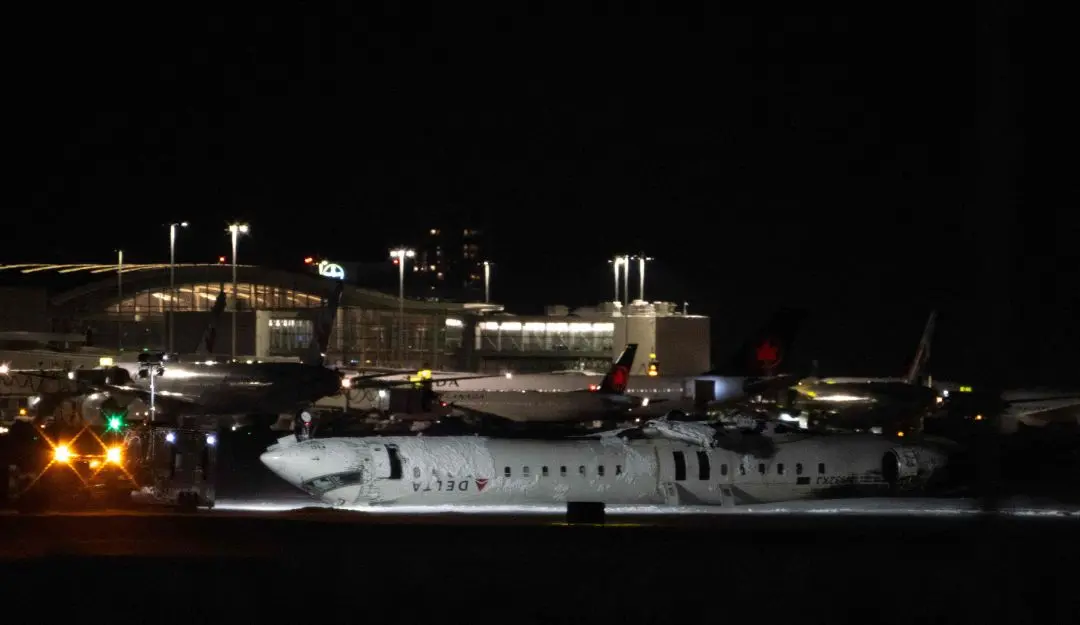 The Delta Air Lines plane that crashed and injured at least 18 passengers at Toronto Pearson International Airport | Photo: AFP