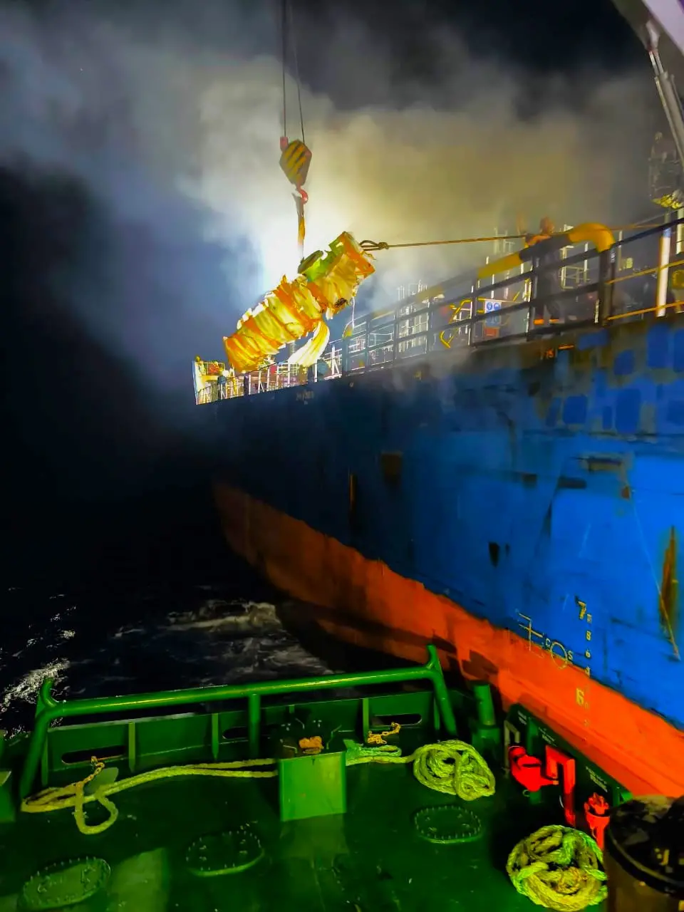 Fuel pump lifted aboard by ship's crane