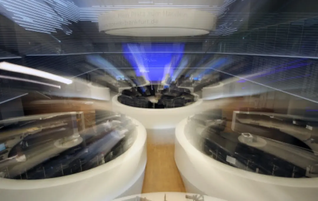 Traders work at the stock exchange in Frankfurt am Main, western Germany | File Photo: AFP