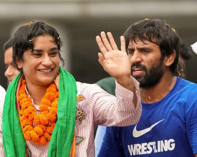 Wrestler Vinesh Phogat with Bajrang Punia | Photo: PTI