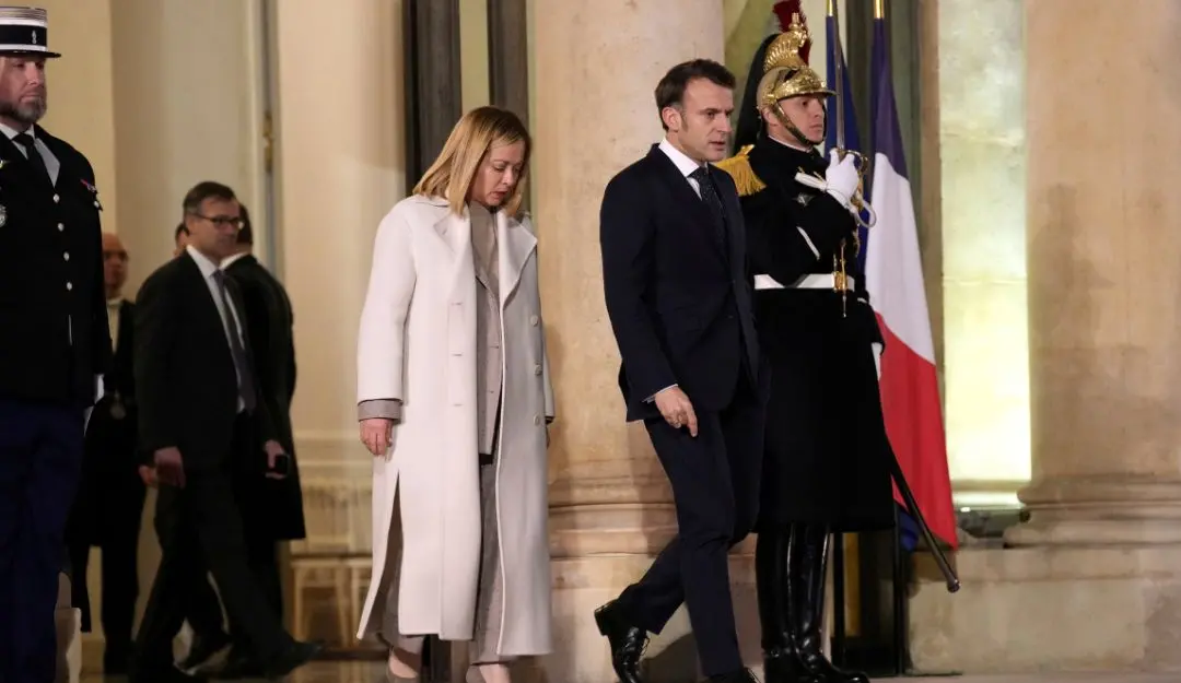 French President Emmanuel Macron, center right, walks with Italy's Prime Minister Giorgia Meloni, center left, as she leaves the Elysee Palace, after an informal meeting of leaders from key European Union nations and the United Kingdom, in Paris | Photo: AP