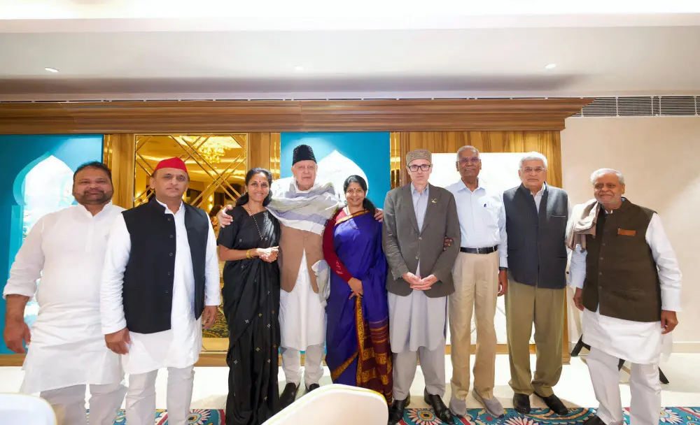 Samajwadi Party Chief Akhilesh Yadav with DMK leader Kanimozhi Karunanidhi, NCP (SCP) leader Supriya Sule, CPI leader D Raja, National Conference President Farooq Abdullah and J&K CM-designate Omar Abdullah before the swearing-in ceremony | PTI
