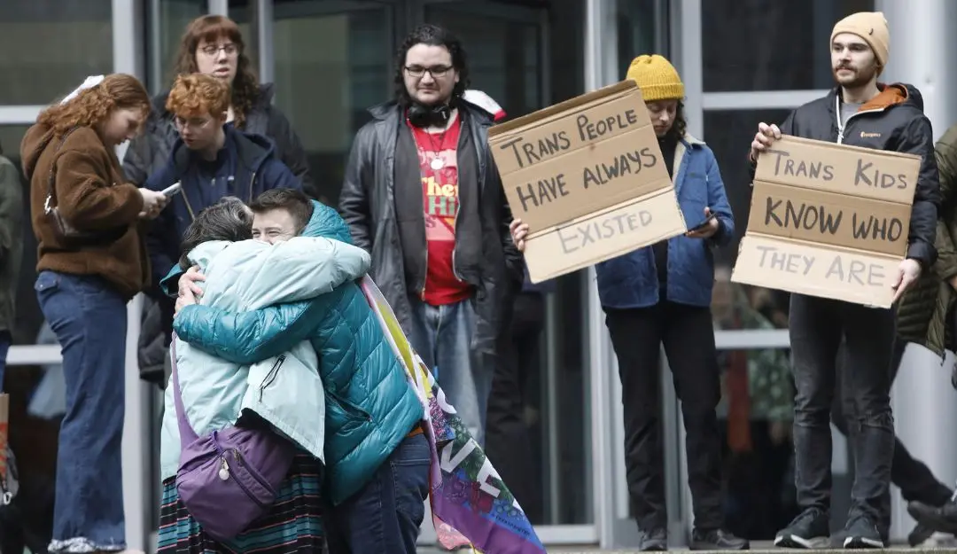 People celebrate outside a Seattle federal courthouse after a second federal judge paused President Donald Trump's order against gender-affirming care for youth | Photo: AP