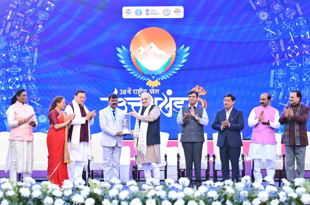 Union Home Minister Amit Shah holds a miniature of Mauli the mascot at the closing ceremony of the 38th National Games, in Haldwani | Photo: ANI