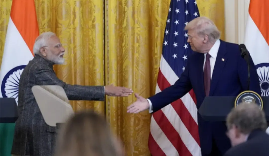 Prime Minister Narendra Modi and US President Donald Trump shake hands during a news conference in the East Room of the White House.