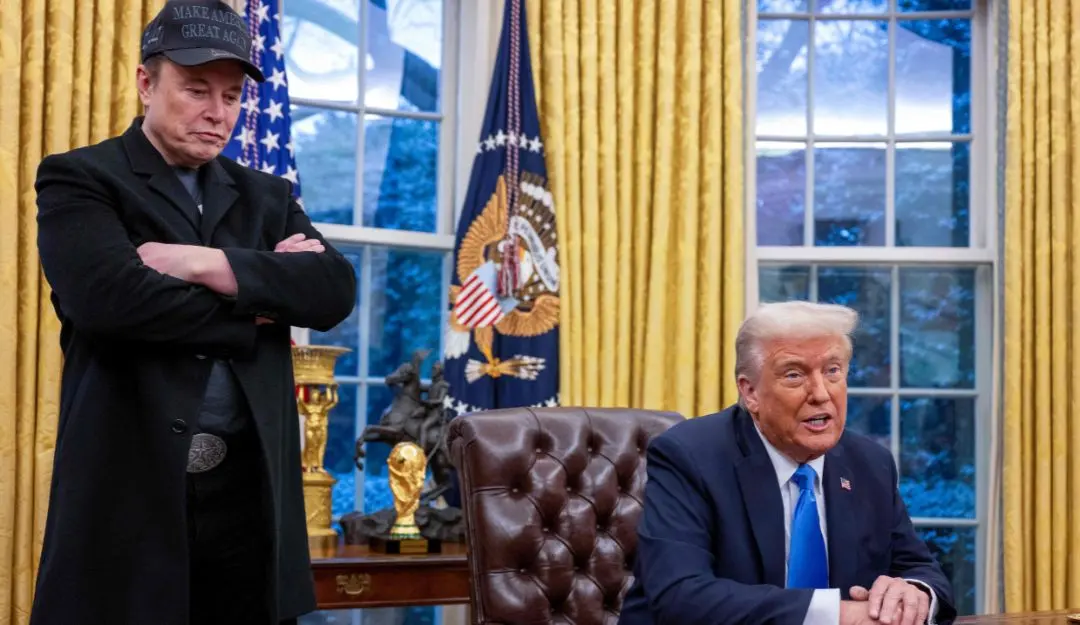 Elon Musk listens as US President Donald Trump speaks in the Oval Office of the White House in Washington DC | Photo: AFP