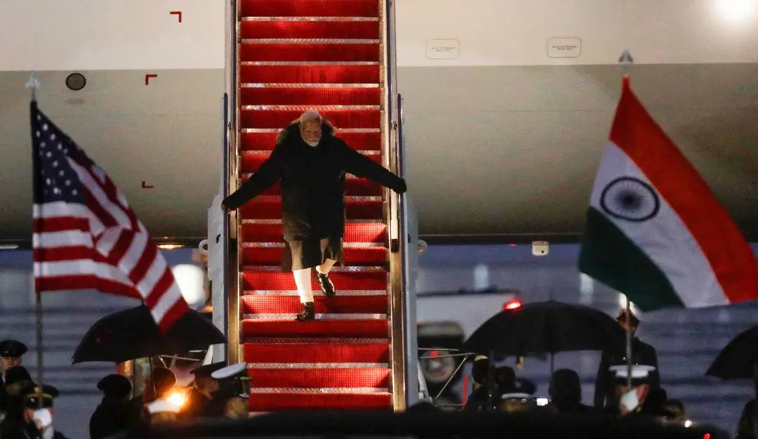 PM Modi walks down the stairs from his plane upon his arrival at Joint Base Andrews, Maryland | Photo: AP