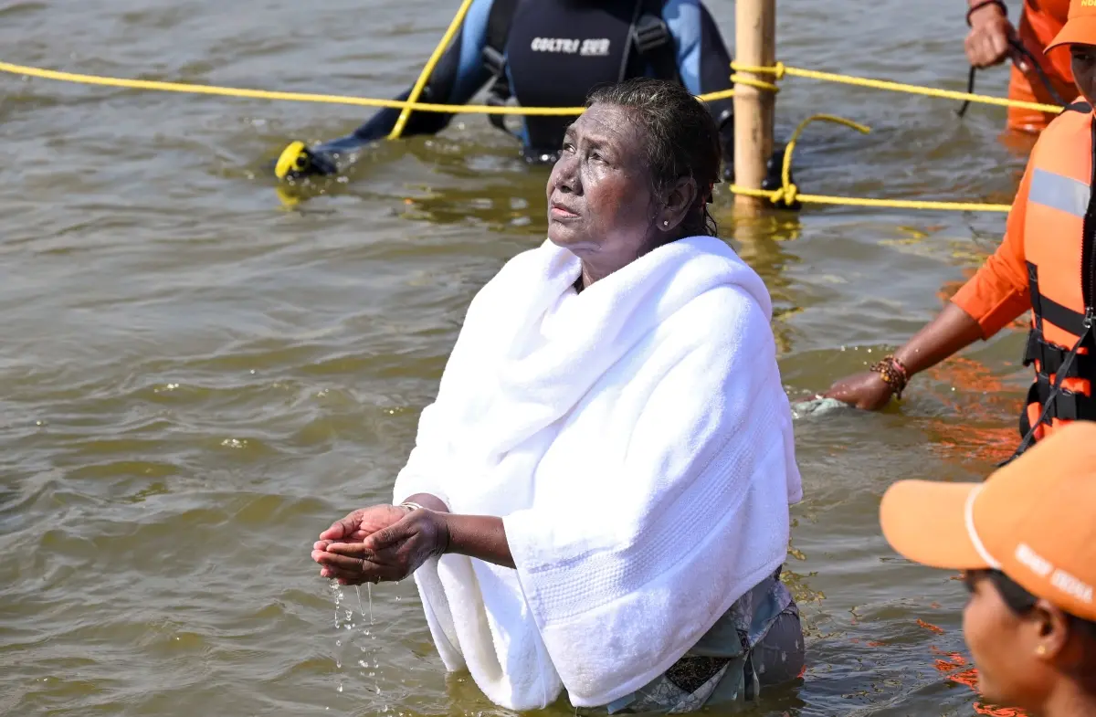 President Droupadi Murmu prays after taking a holy dip at the Sangam during Maha Kumbh Mela 2025 | Photo: PTI