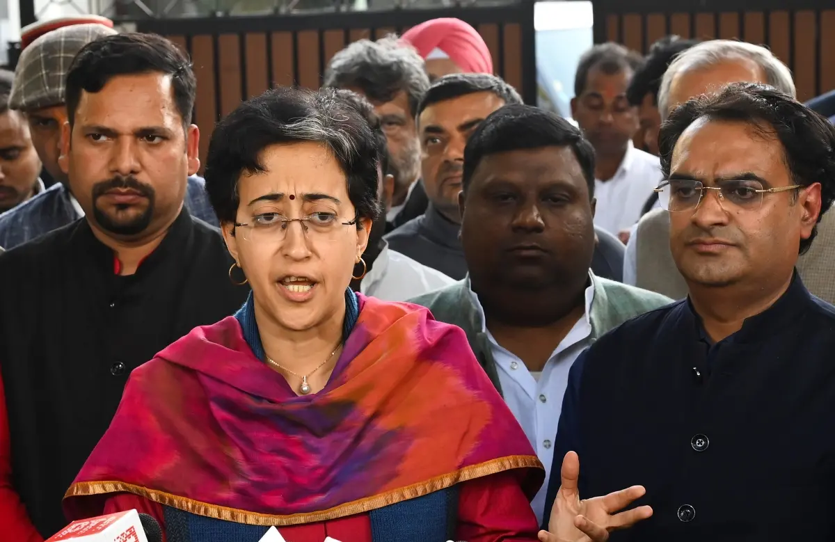 Outgoing Delhi chief minister Atishi with AAP winning candidates addresses the media after a meeting with party convenor Arvind Kejriwal, outside his residence | Photo: PTI