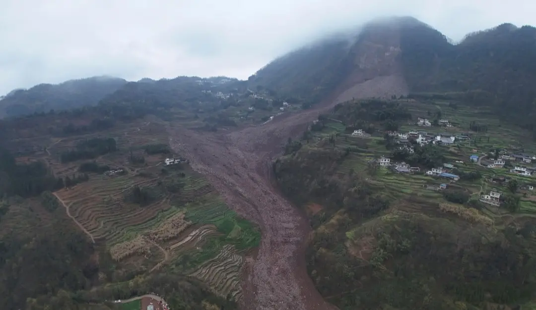 An aerial drone photo shows the site of a landslide in Jinping Village