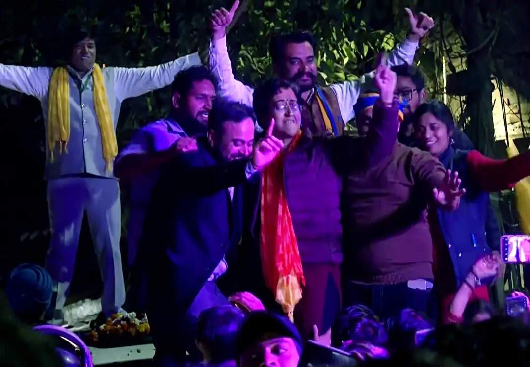 Delhi Chief Minister and AAP candidate from Kalkaji Assembly seat Atishi with party workers and supporters dances and celebrates her win in the Delhi Assembly elections | Photo: ANI