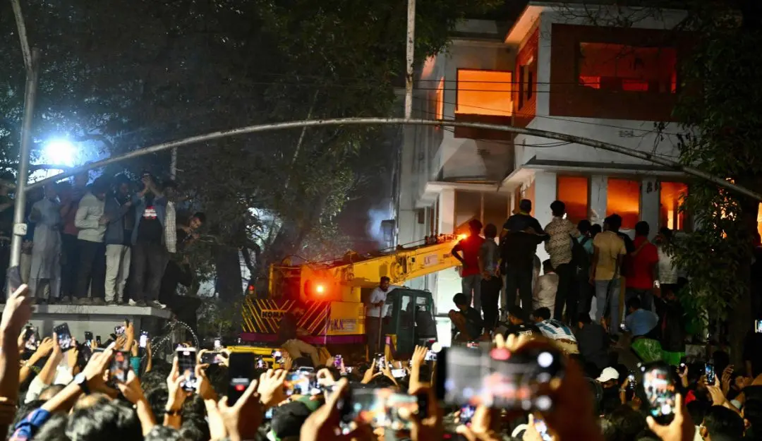 Protesters use a crane truck to demolish the Bangabandhu Memorial Museum, the former residence of Sheikh Mujibur Rahman father of the former Prime Minister Sheikh Hasina, as they storm the Museum in Dhaka | Photo: AFP