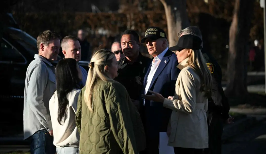 US President Donald Trump and First Lady Melania Trump meet residents as they tour a fire-affected area in Los Angeles (Photo: AP)