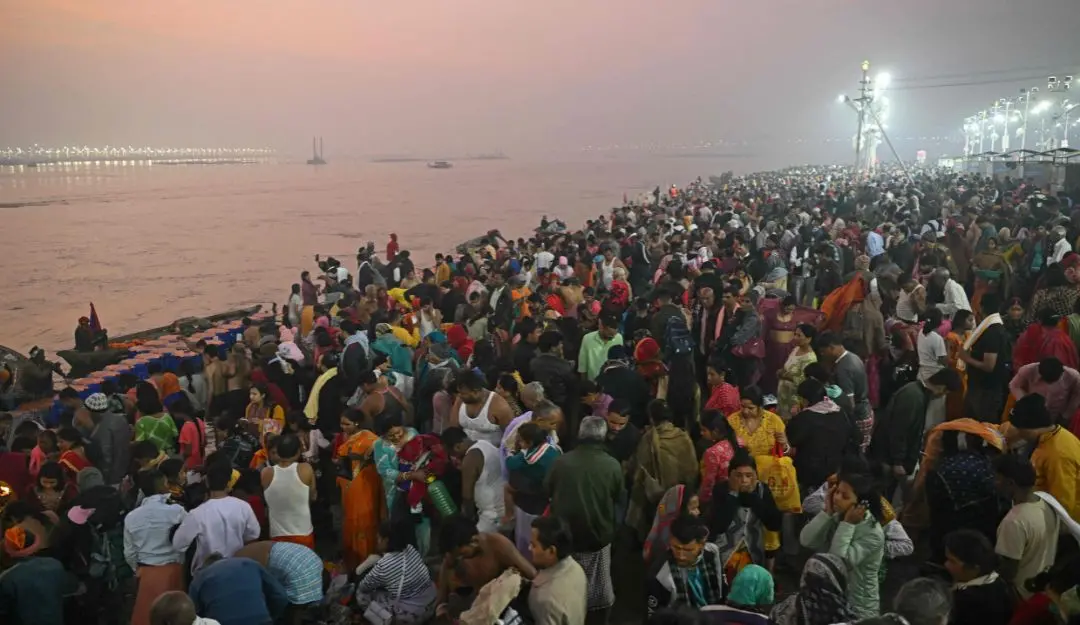 Pilgrims gather to take a holy dip at Sangam during the Maha Kumbh Mela festival in Prayagraj | Photo: AFP