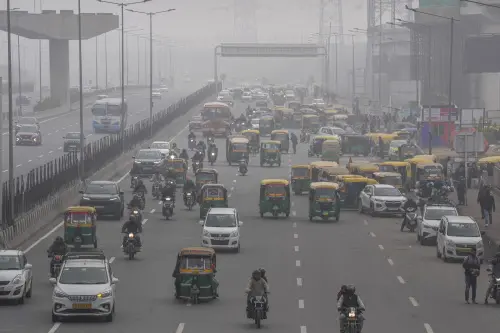 Vehicles move on a road amid fog during cold winter morning. | PTI