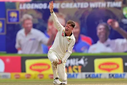 Australia's Matthew Kuhnemann unsuccessfully appeals for leg before wicket (LBW) against Sri Lanka's Jeffrey Vandersay during the fourth day of the first Test cricket match between Sri Lanka and Australia at the Galle International Cricket Stadium in Galle on February 1, 2025. | Photo by : AFP