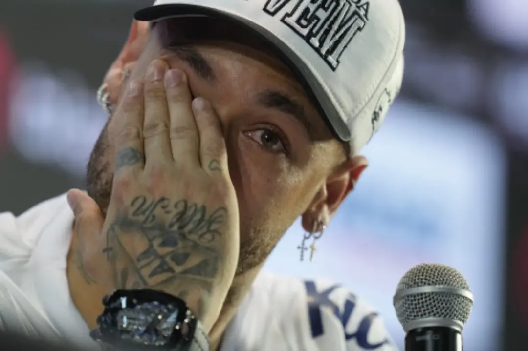 Brazilian soccer player Neymar wipes his eye during a news conference after signing a six-month contract with Santos FC at Vila Belmiro Stadium in Santos. | Photo: AP/PTI