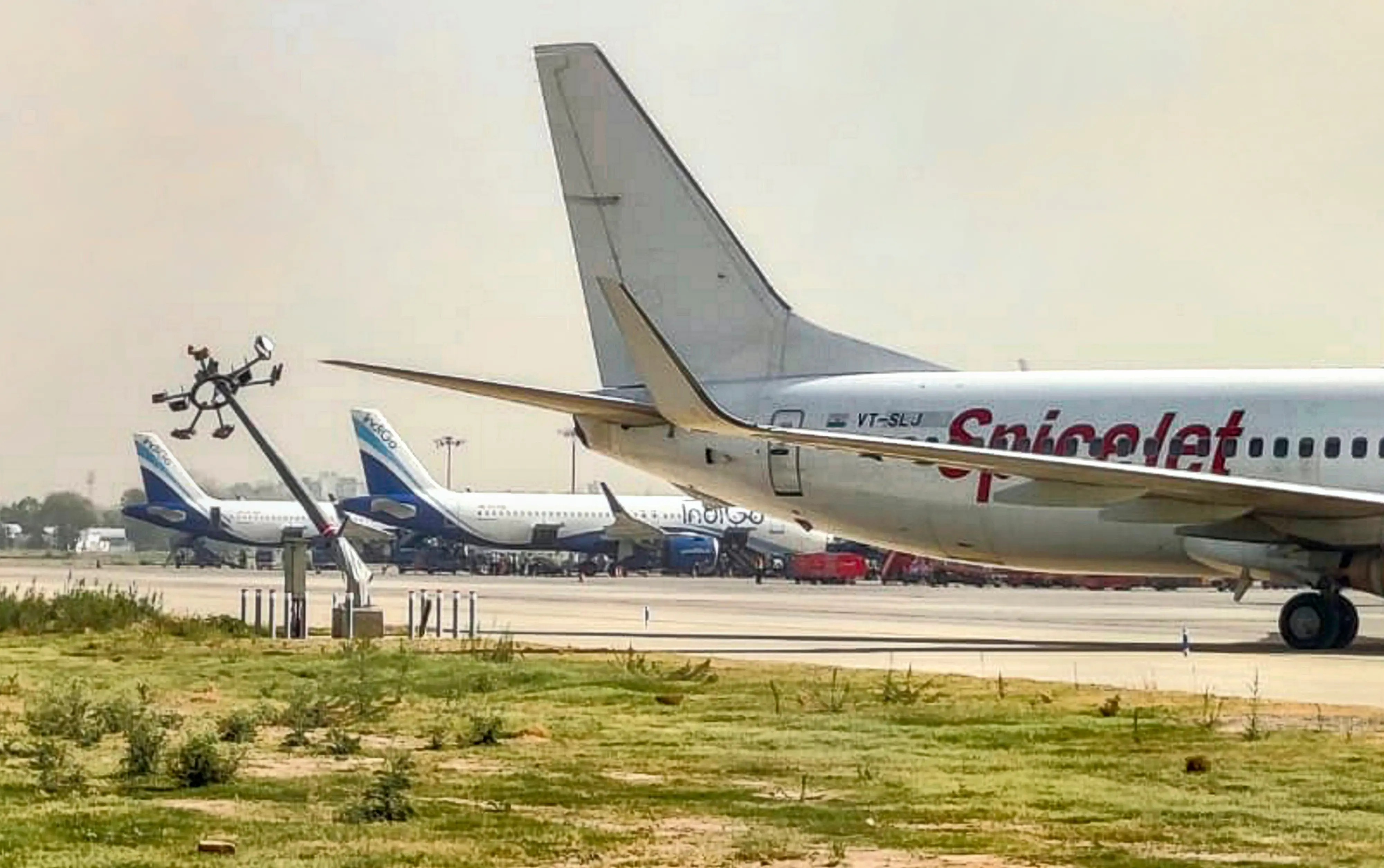 A SpiceJet aircraft after it hit a pole on the tarmac, at IGI Airport, New Delhi. Photo: PTI