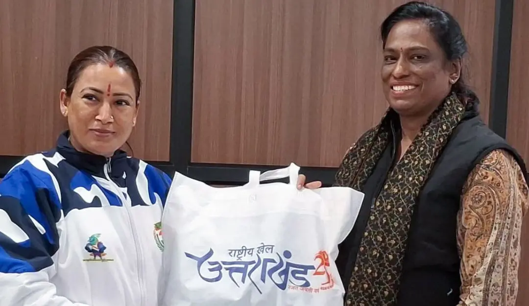 Uttarakhand Sports Minister Rekha Arya invites Indian Olympic Association (IOA) president PT Usha on the eve of 38th National Games in Dehradun on Monday.