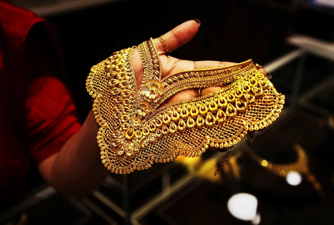 A gold necklace displayed at a jewellery showroom